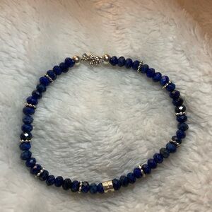 Elegant Lapis Beaded Bracelet with Silver Spacers and Charms